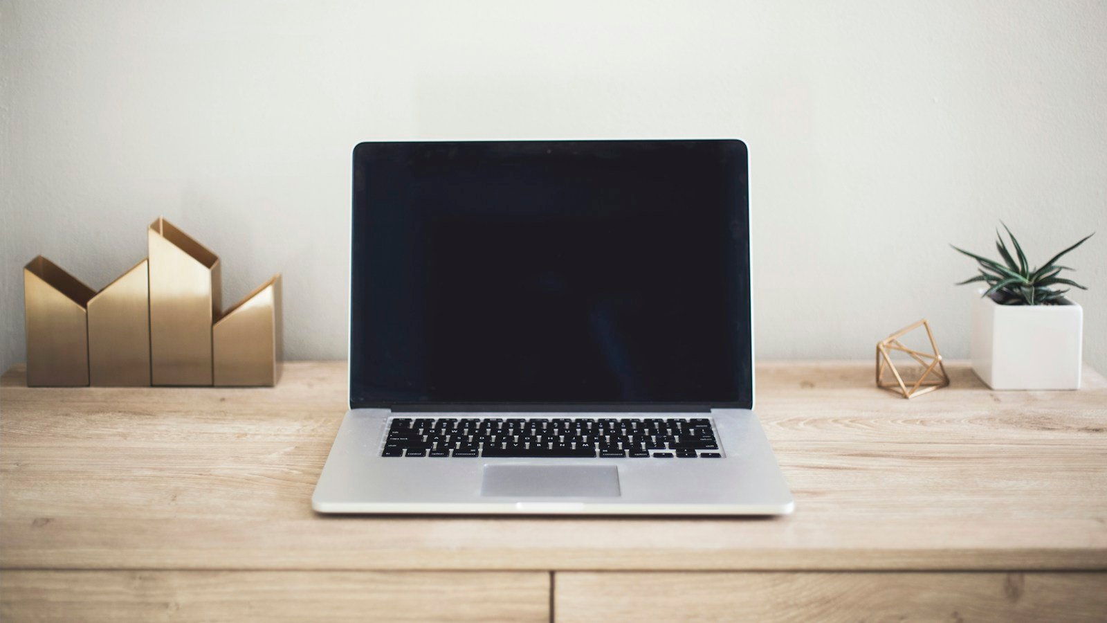 Laptop on a desk representing preparation for a WordPress website migration